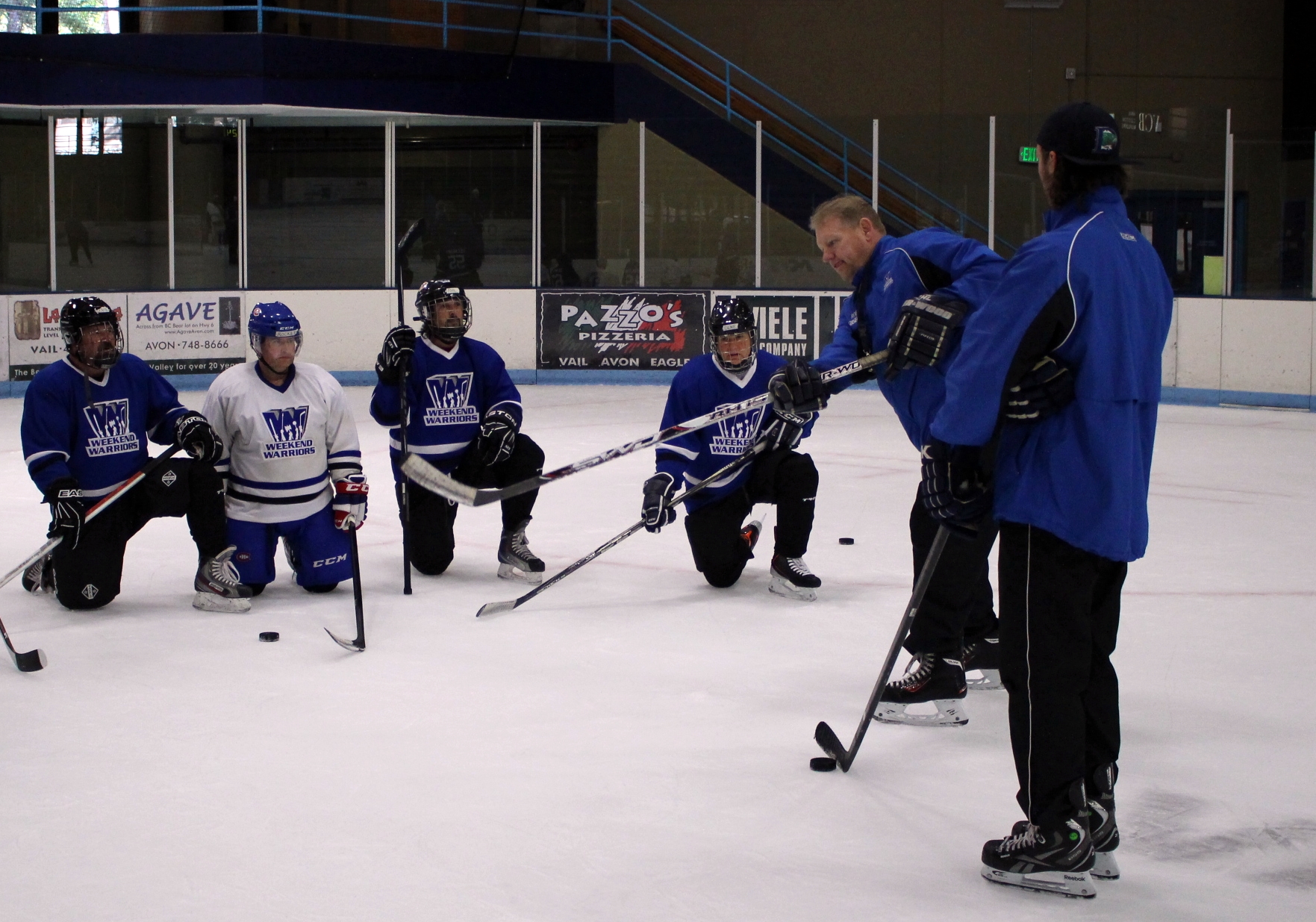 Coach Rob demonstrates wrist shot