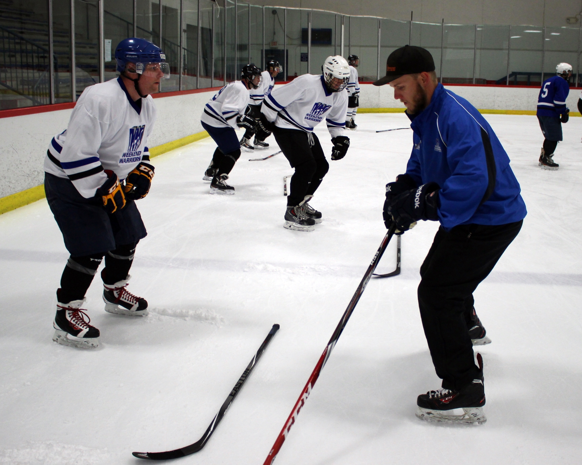 Coach Justin helps a player feel his edges