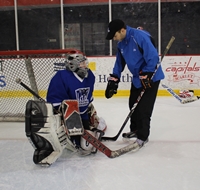 Coach Nick with the goalies