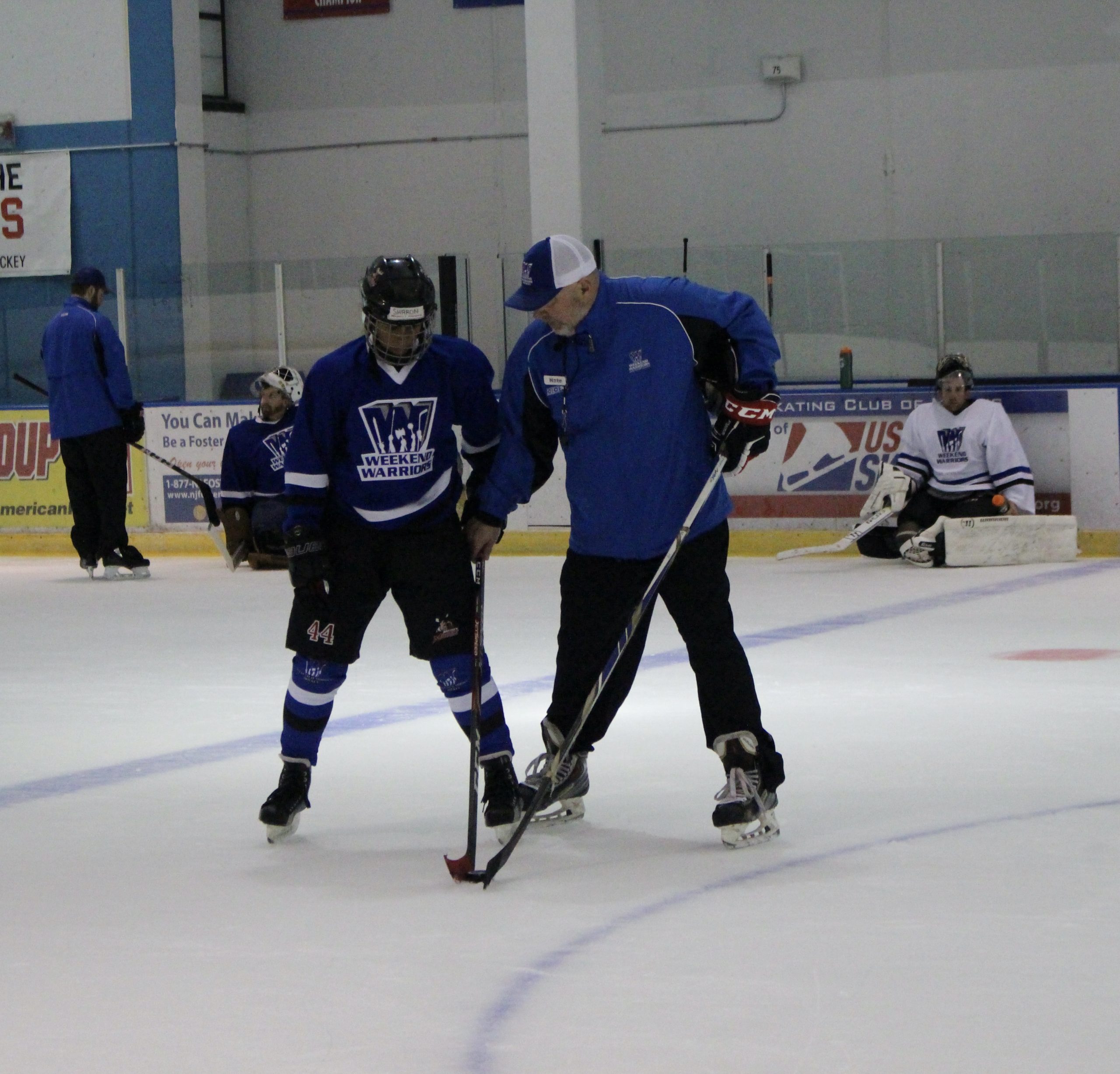 Coach Justin helps a player feel his edges