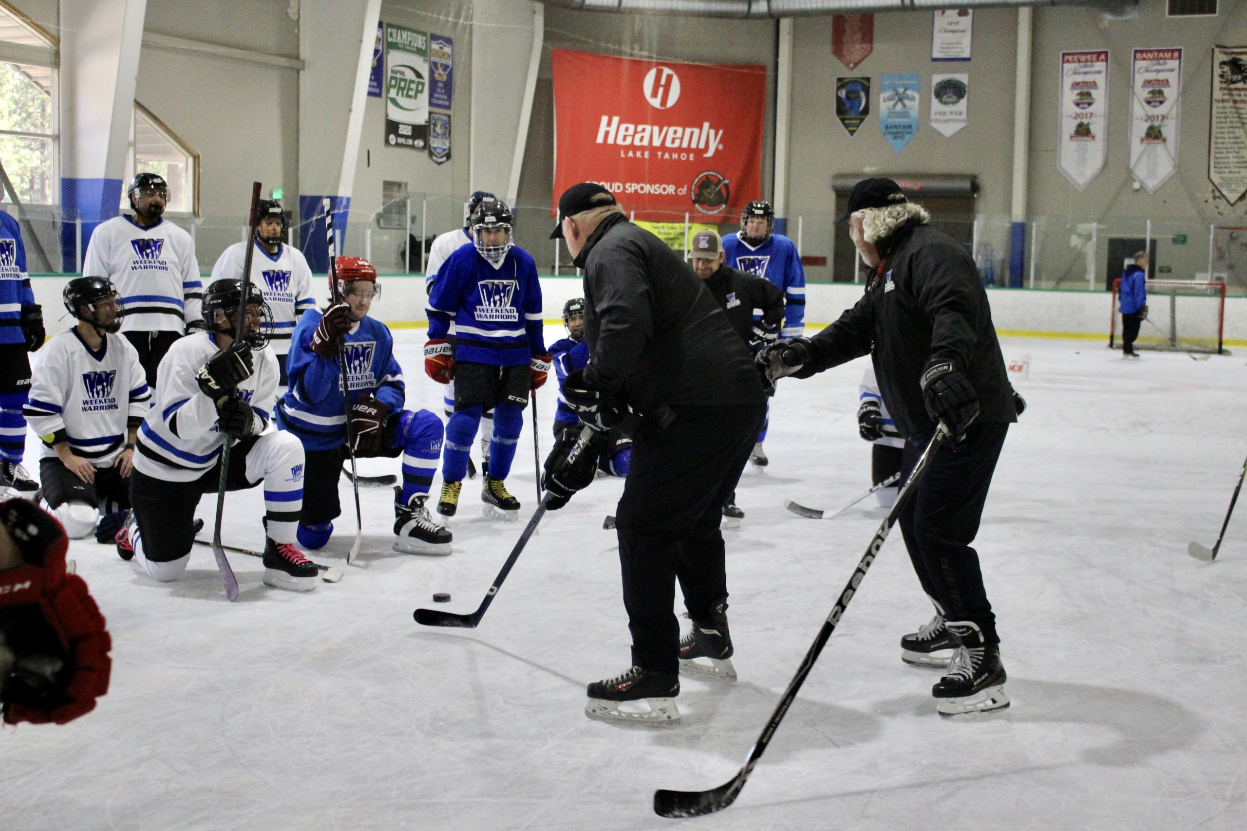 Coaches Rob and Jimmy demonstrate a puck protection drill