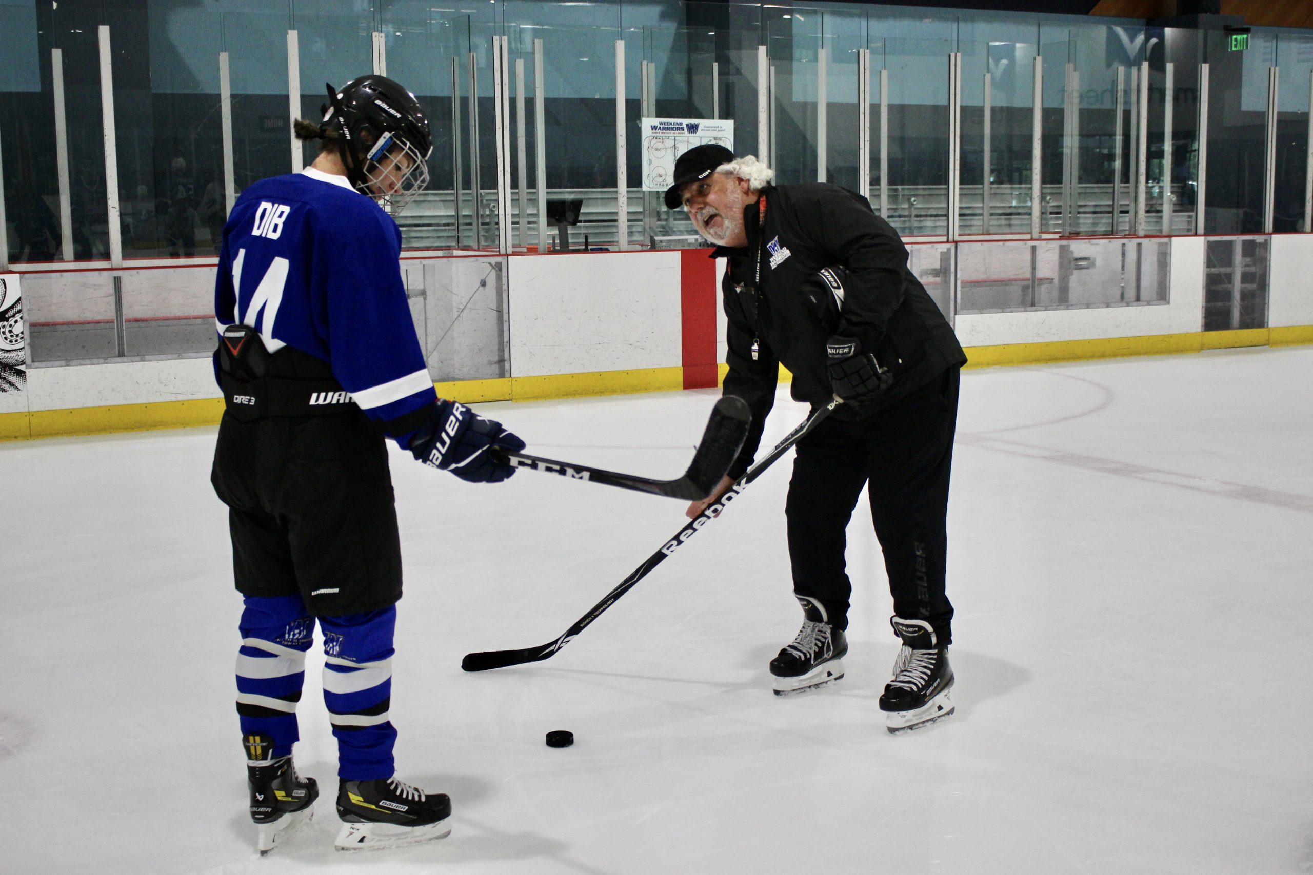 Coach Justin helps a player feel his edges